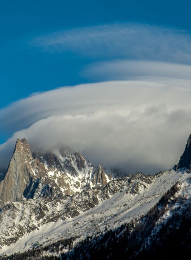 Alpine summit under clouds